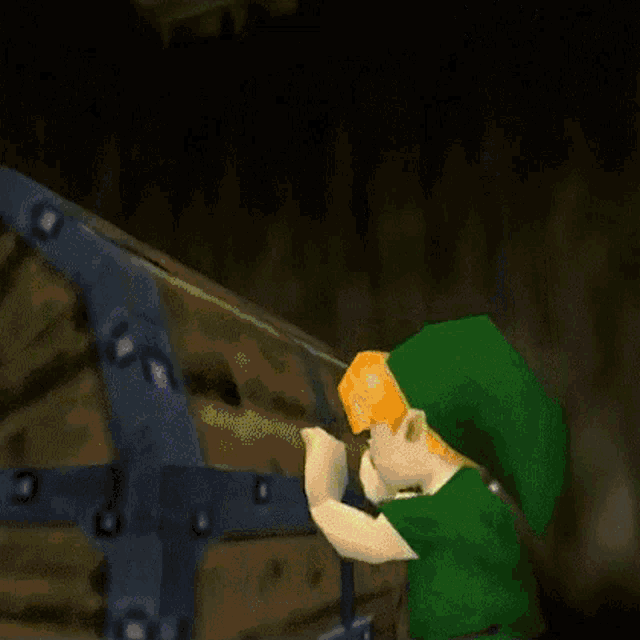 a cartoon character is reaching into a treasure chest with a yellow light coming out of it .