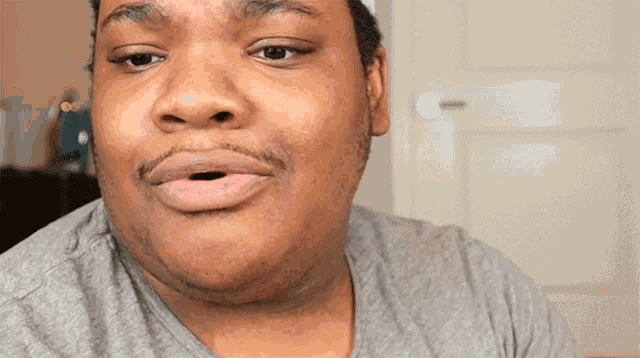 a close up of a man 's mouth with his mouth open