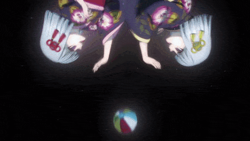two anime girls are upside down with a ball in the background