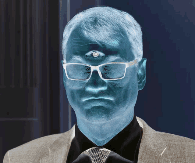 a man in a suit and tie has a third eye on his forehead