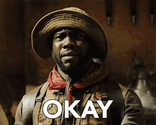 a man wearing a hat and a bandana has the word okay written on his chest