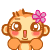 a cartoon monkey with a flower in its hair is looking at the camera .