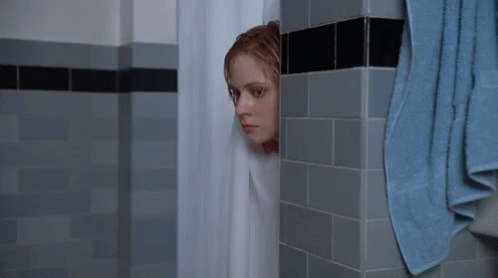 Shower Peek GIF - Elf Zooey Deschanel Shower Peek GIFs