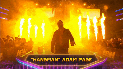a wrestler named hangman is walking through a crowd of people