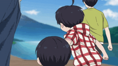 a boy in a plaid shirt holds the hand of another boy in a green shirt