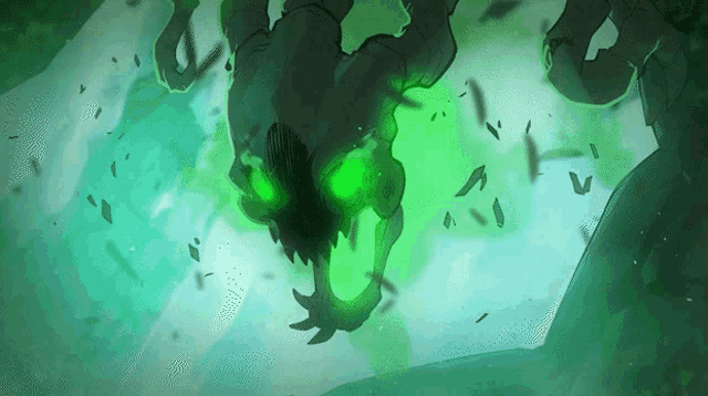 a drawing of a monster with green eyes and sharp teeth
