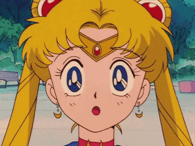 a close up of a cartoon girl with a crown on her head
