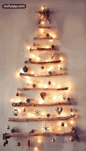 a christmas tree made out of branches and decorations