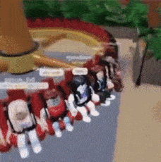 a group of people are sitting on a roller coaster with a sign that says g + d