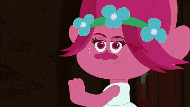 a cartoon character with pink hair and blue flowers on her head