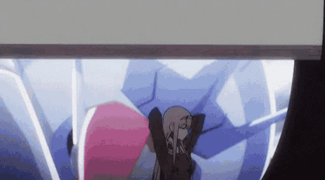 a girl is standing next to a robot in a room .