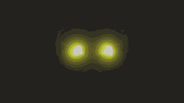 a pair of yellow wings glowing in the dark
