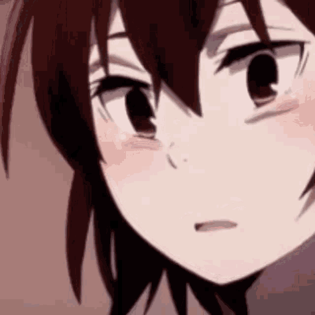 a close up of a person 's face with a tear coming out of her eye .