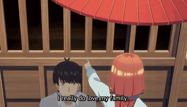 a girl says i really do love my family next to a man