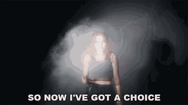 a woman says so now i 've got a choice in front of smoke