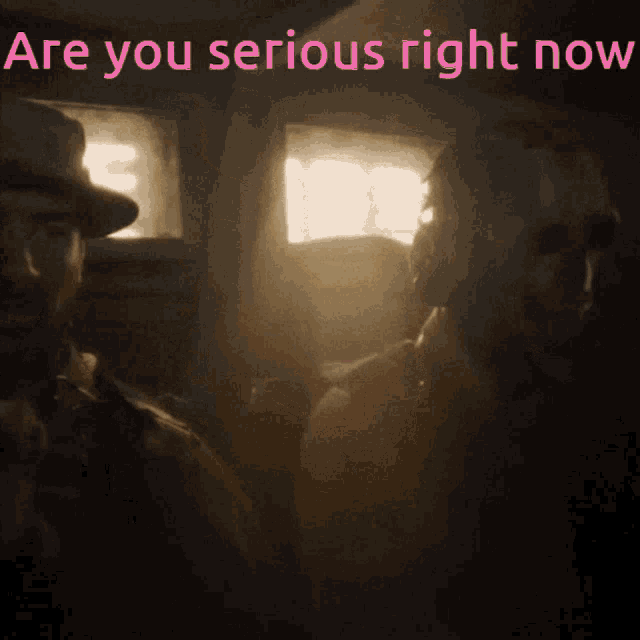 a man in a hat is standing next to another man with the words are you serious right now