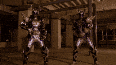 a couple of people standing next to each other with purple light coming out of their bodies