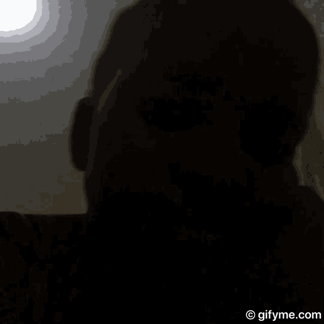 a close up of a person 's face with the website gifyme.com at the bottom of the image