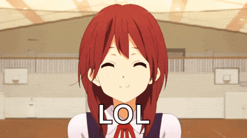 a girl with red hair is smiling and the word lol is above her head