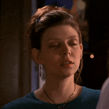 a woman says " it does n't feel evil " in yellow text