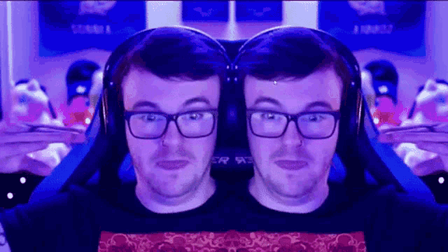 a man wearing glasses and headphones is sitting in a chair and making a funny face .