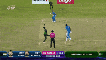 a cricket game is being played with advertisements for ixigo and super 11