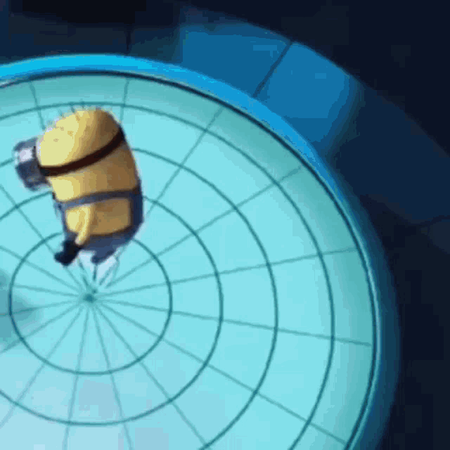 a cartoon minion is flying through the air on a blue surface .