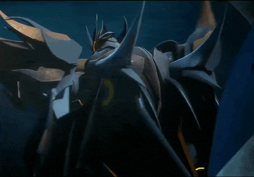 a close up of a robot with horns and a yellow light