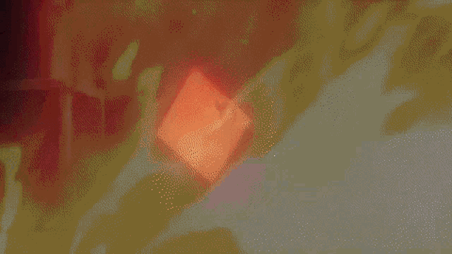 a red background with a white square in the middle of it