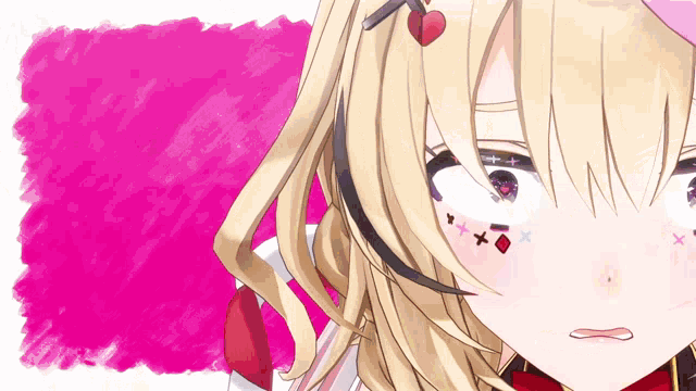a close up of a girl 's face with a heart in her hair