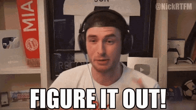 a man wearing headphones says " figure it out " in a video