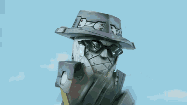 a close up of a robot with a blue sky behind it