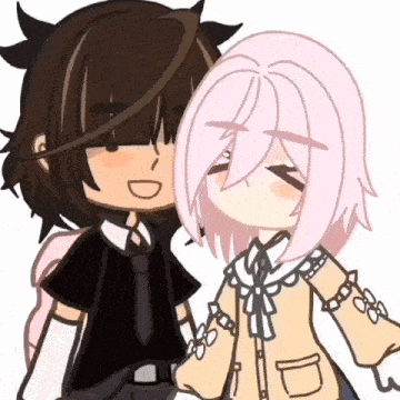 a boy and a girl are holding hands and smiling
