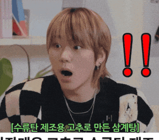 a young man with a surprised look on his face is surrounded by asian writing