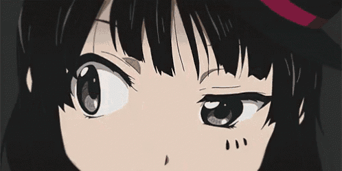 a close up of a anime girl 's eyes with a red bow on her head .