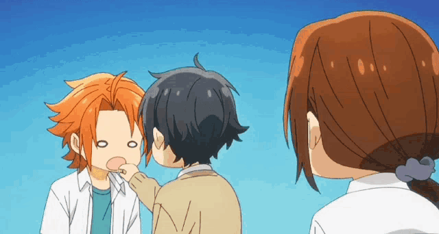 a couple of anime characters talking to each other with one making a face