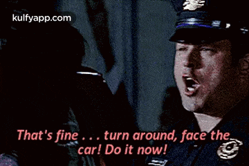 a woman is sitting in a car and says that 's fine turn around face the car do it now .