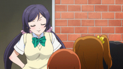 a girl with purple hair wearing a green bow tie