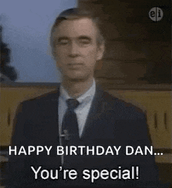 a man in a suit and tie is saying `` happy birthday dan ... you 're special ! ``