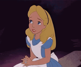 alice from alice in wonderland is sitting on a rock