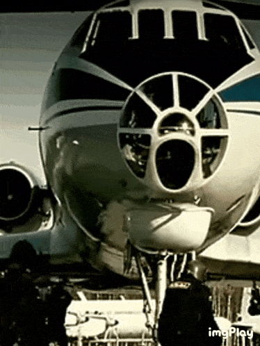 a close up of a plane with the word imgplay on the bottom left
