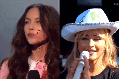 a woman with blood on her face is next to a woman with a cowboy hat on