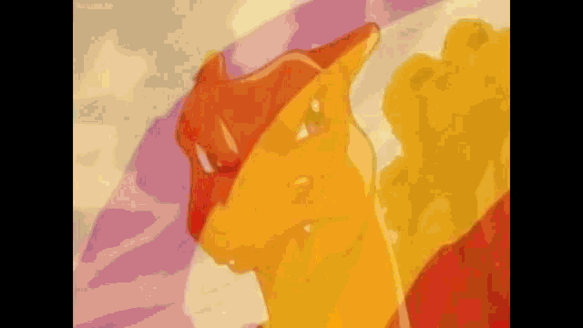 a cartoon character is standing in front of a rainbow colored background .