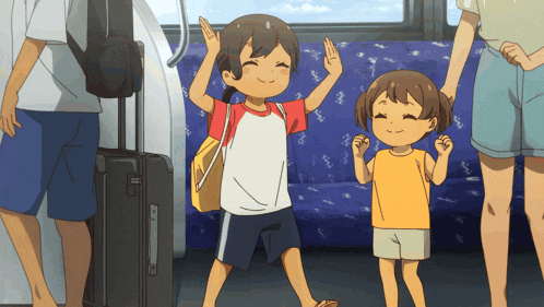 a boy and a girl are standing next to each other on a train
