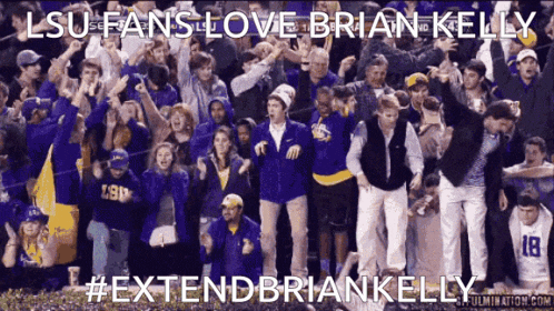 a group of people standing in front of a sign that says extendbriankelly