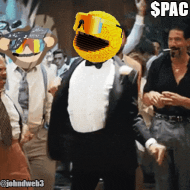 a man in a tuxedo has a pac man head on his head