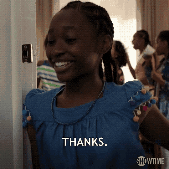 a young girl in a blue dress says thanks