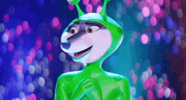 a cartoon character wearing a green alien costume is standing in front of a blurry background .
