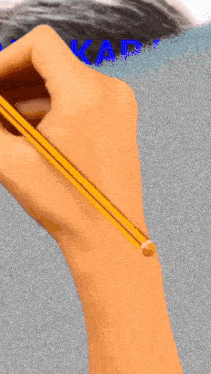 a hand is holding a pencil and writing the name ady karaman
