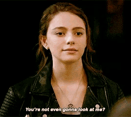 a woman in a leather jacket is asking if she 's not even gonna look at her